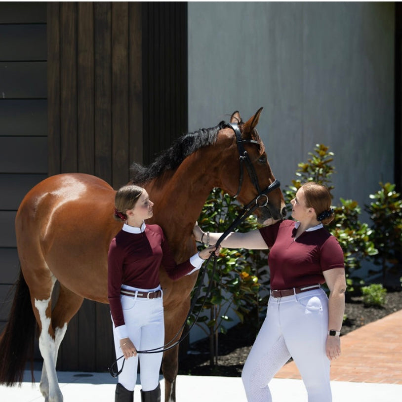 2 girls with a horse