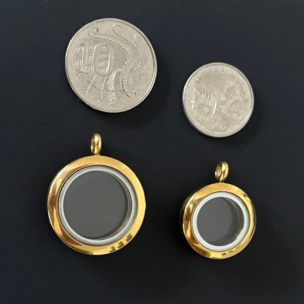 Lockets next to coins