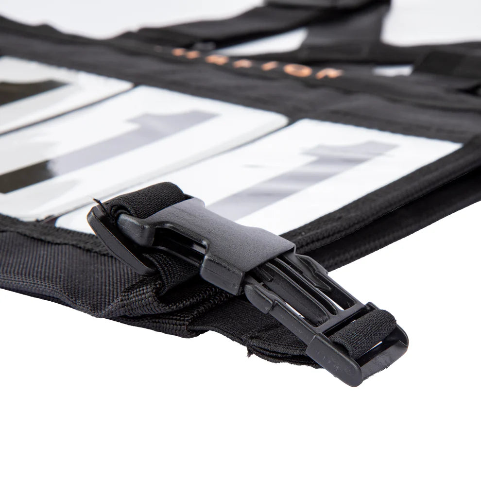 Close-up of a black strap with a buckle on a white background